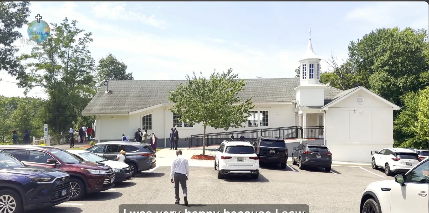 Church exterior and gathering at Mission of the True Church of God